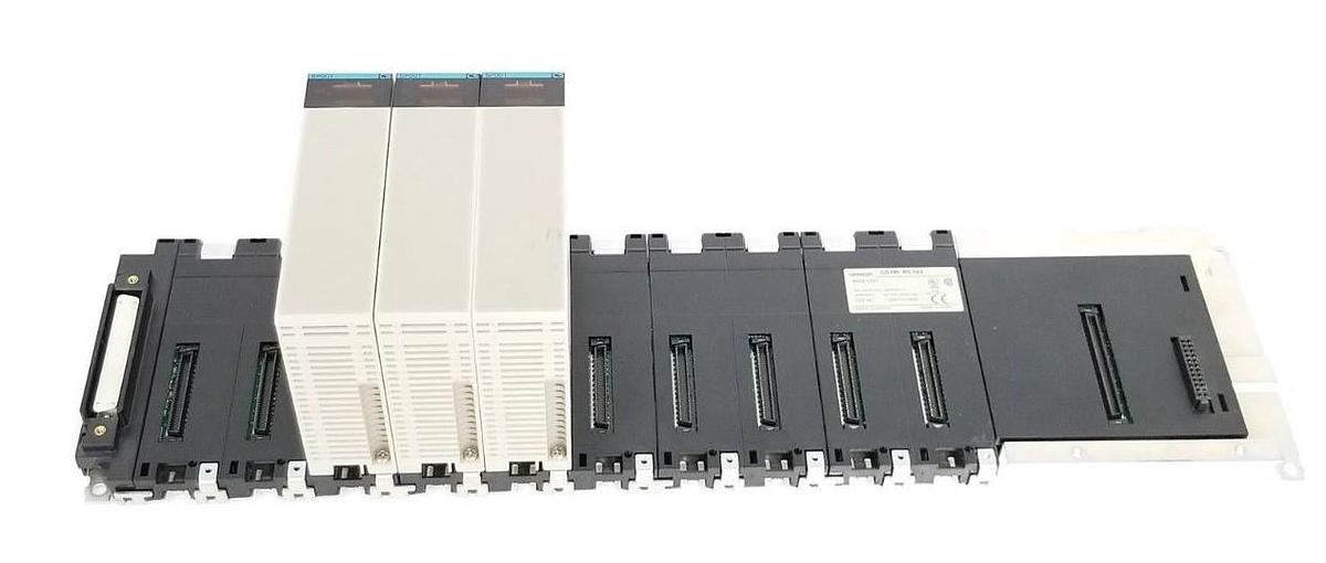 Used OMRON CS1W-BC102 SLOT RACK BASE UNIT W/ (3) CS1W-SP001 SPACE UNITS
