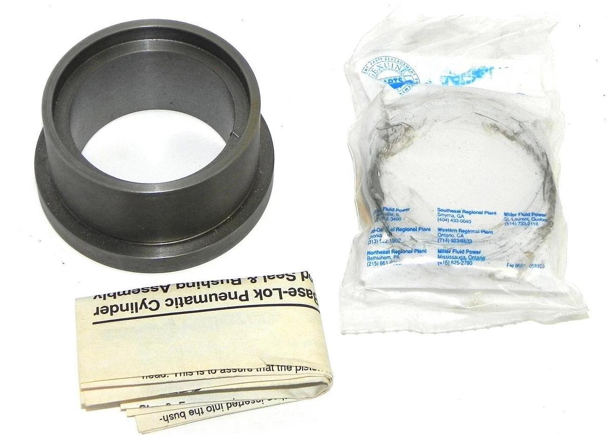 Used NIB MILLER BASE LOK 051-KR014-200 CYLINDER ROD SEAL AND BUSHING ASSEMBLY