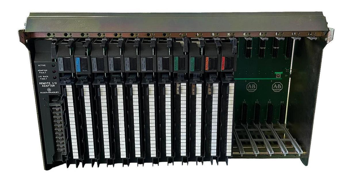 Used ALLEN BRADLEY 1771-A4B SER B 16-SLOT I/O CHASIS W/ MODULES