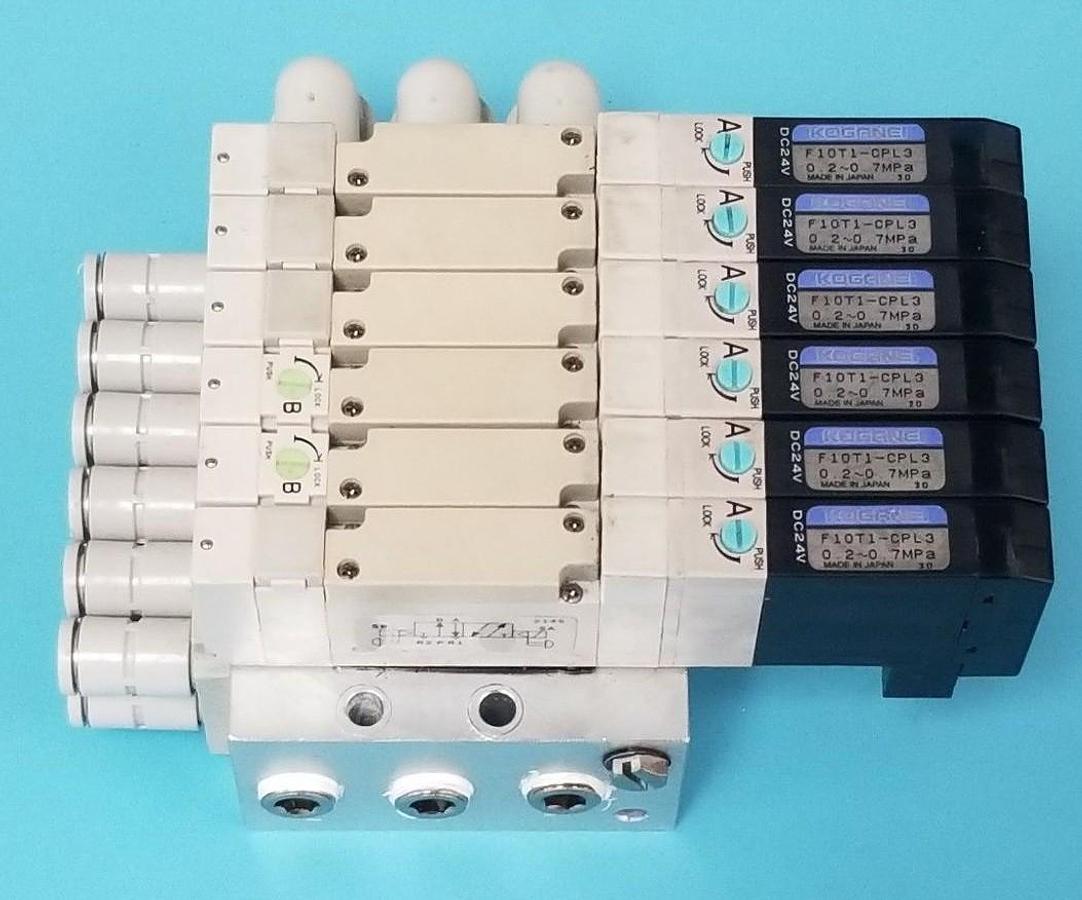 Used KOGANEI F10M6AJ BASE W/ 6 F10T1-CPL3 SOLENOID VALVES DC24V