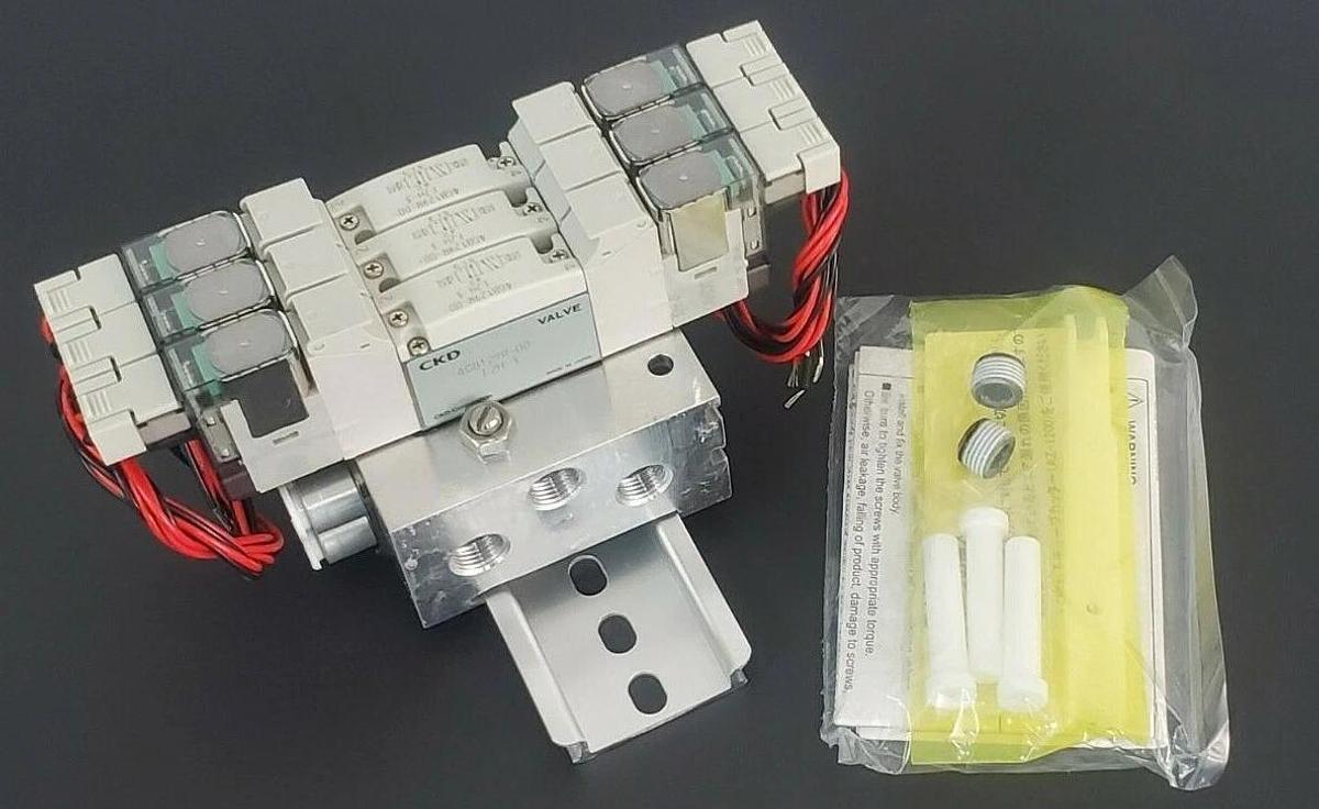 Used NIB CKD M4GB120R-C6-E2HD-3-3 VALVE MANIFOLD ASSEMBLY DC24V, M4GB120RC6E2HD33