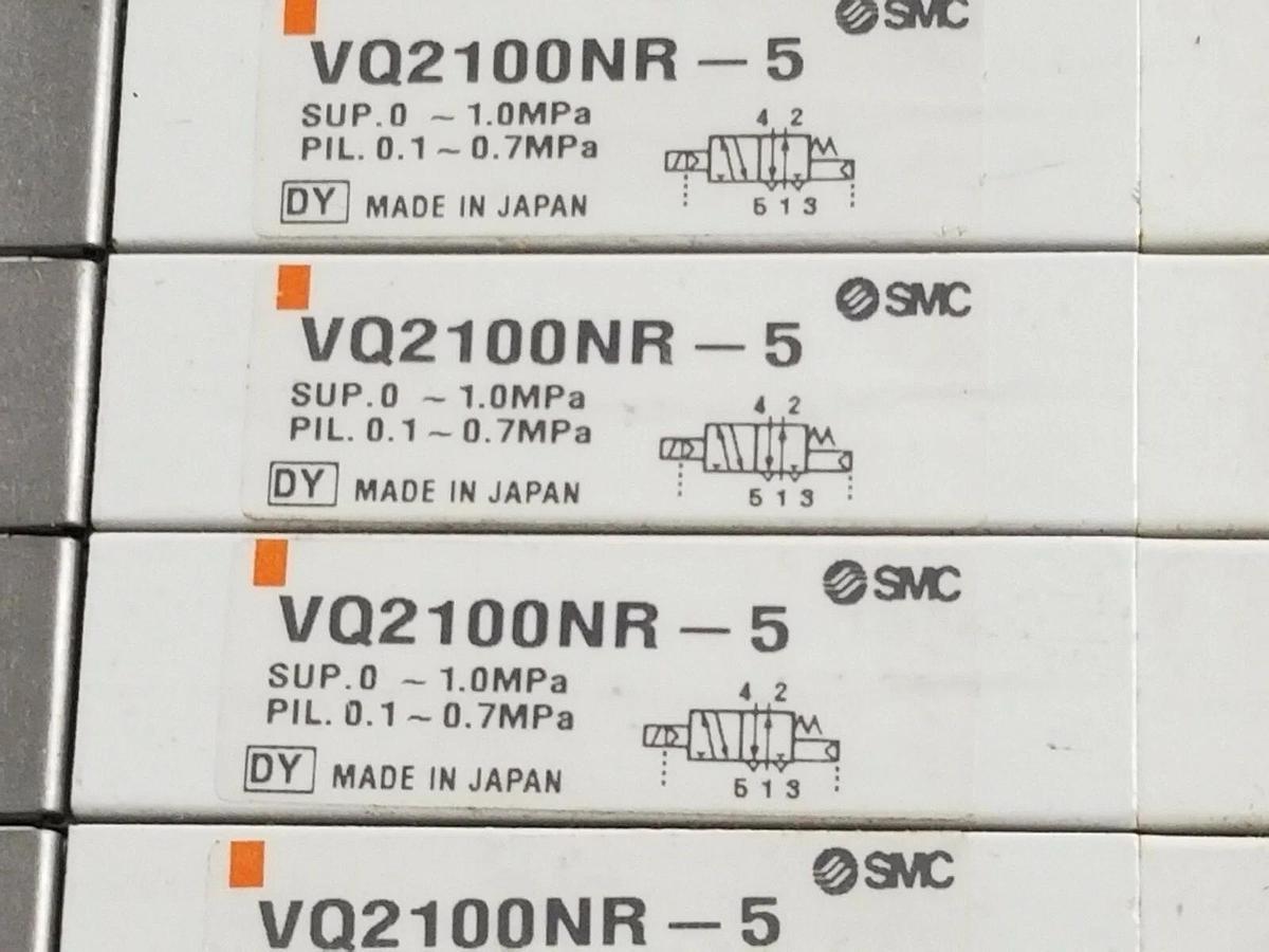 Used SMC 10 POS. MANIFOLD BLOCK WITH (9) VQ2100NR-5 PLUG-IN SOLENOID VALVES VQ2100NR5