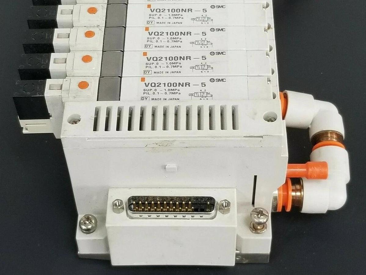 Used SMC 10 POS. MANIFOLD BLOCK WITH (9) VQ2100NR-5 PLUG-IN SOLENOID VALVES VQ2100NR5