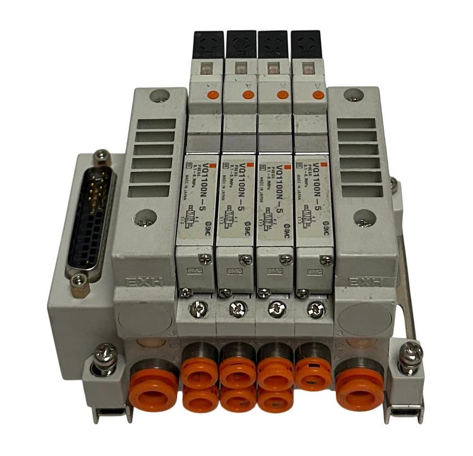 Used SMC EXH MANIFOLD BANK/BLOCK 4-PORT W/ VQ1100N-5 SOLENOID VALVES 24VDC USNP