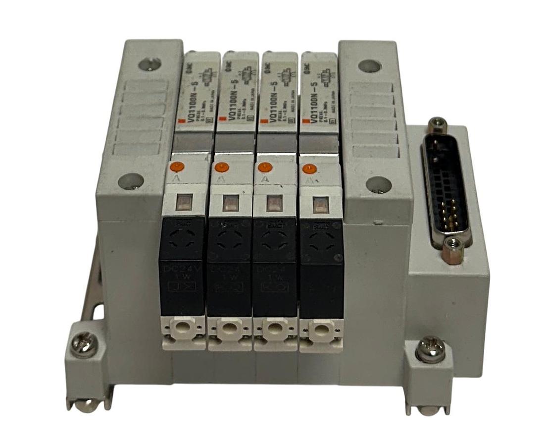Used SMC EXH MANIFOLD BANK/BLOCK 4-PORT W/ VQ1100N-5 SOLENOID VALVES 24VDC USNP