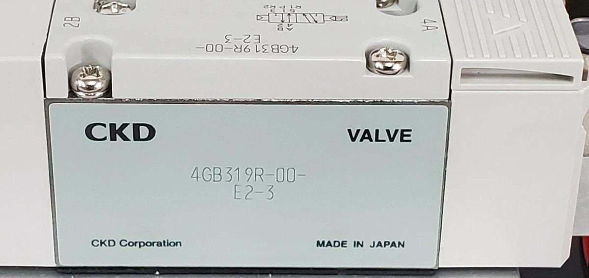 Used NIB CKD M4GB310R-C10-E2D-2-3 VALVE MANIFOLD ASSEMBLY DC24V M4GB310RC10E2D23