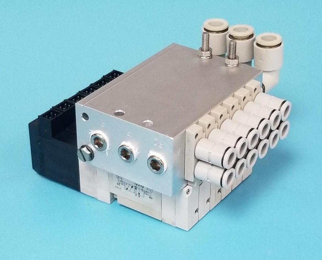 Used KOGANEI F10M6AJ BASE W/ 6 F10T1-CPL3 SOLENOID VALVES DC24V