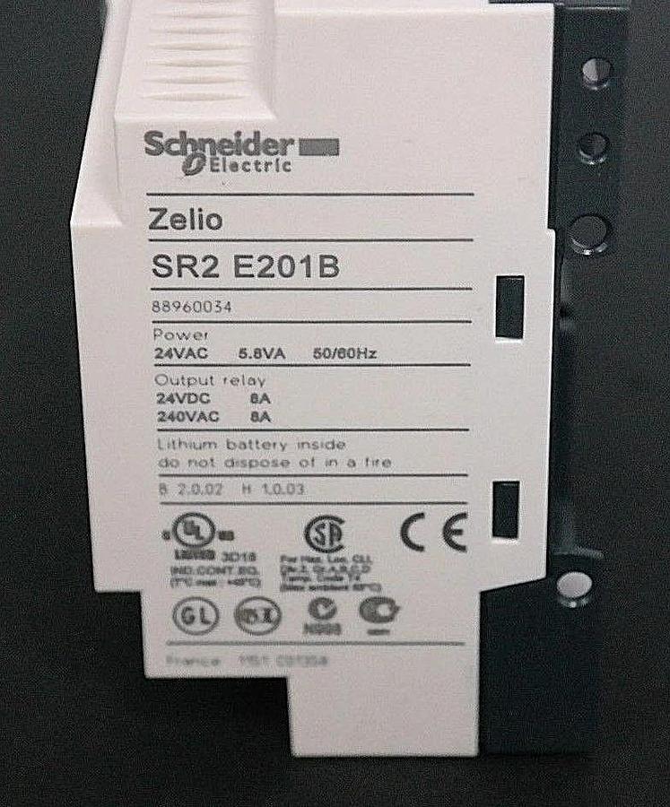 Used NIB SCHNEIDER SR2 E201B BASIC SMART RELAY LOGIC MODULE W/ CLOCK 054984 88960034