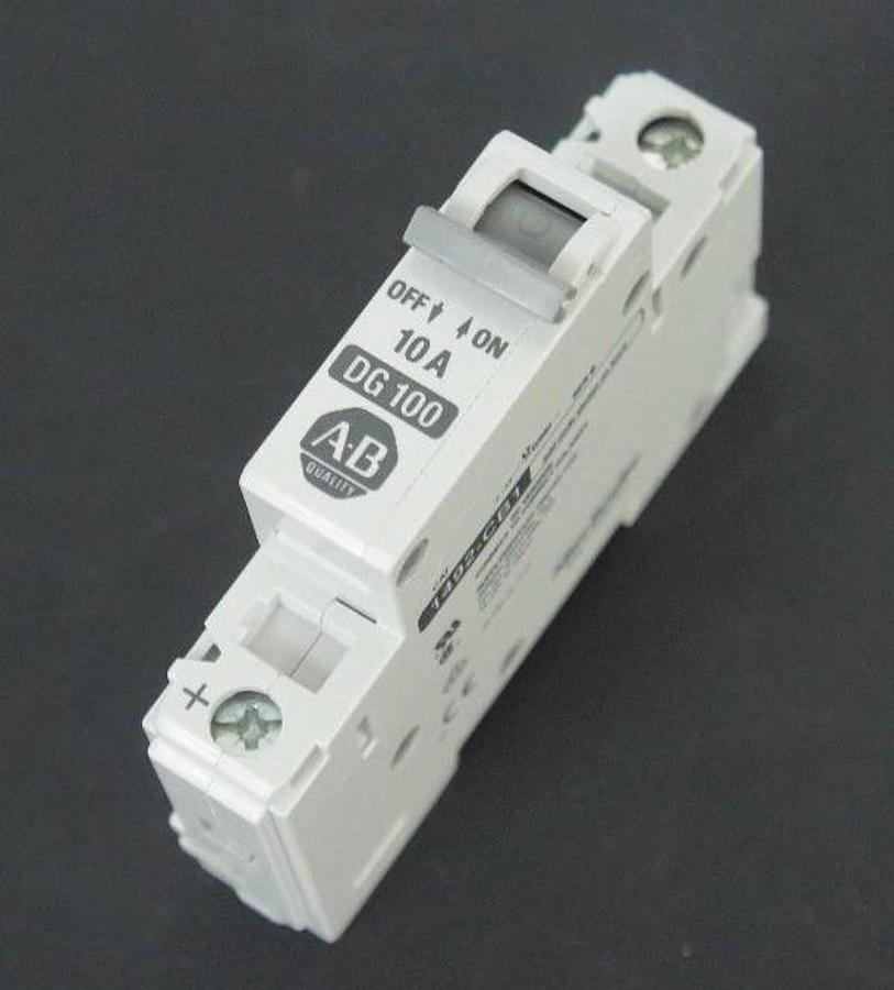 Used NIB ALLEN BRADLEY 1492-CB1DG100 CIRCUIT BREAKER 10 AMP, 1492CB1DG100, SER. B