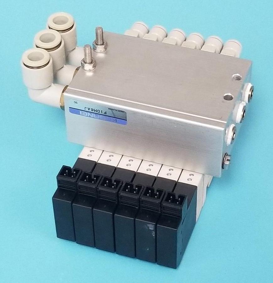 Used KOGANEI F10M6AJ BASE W/ 6 F10T1-CPL3 SOLENOID VALVES DC24V