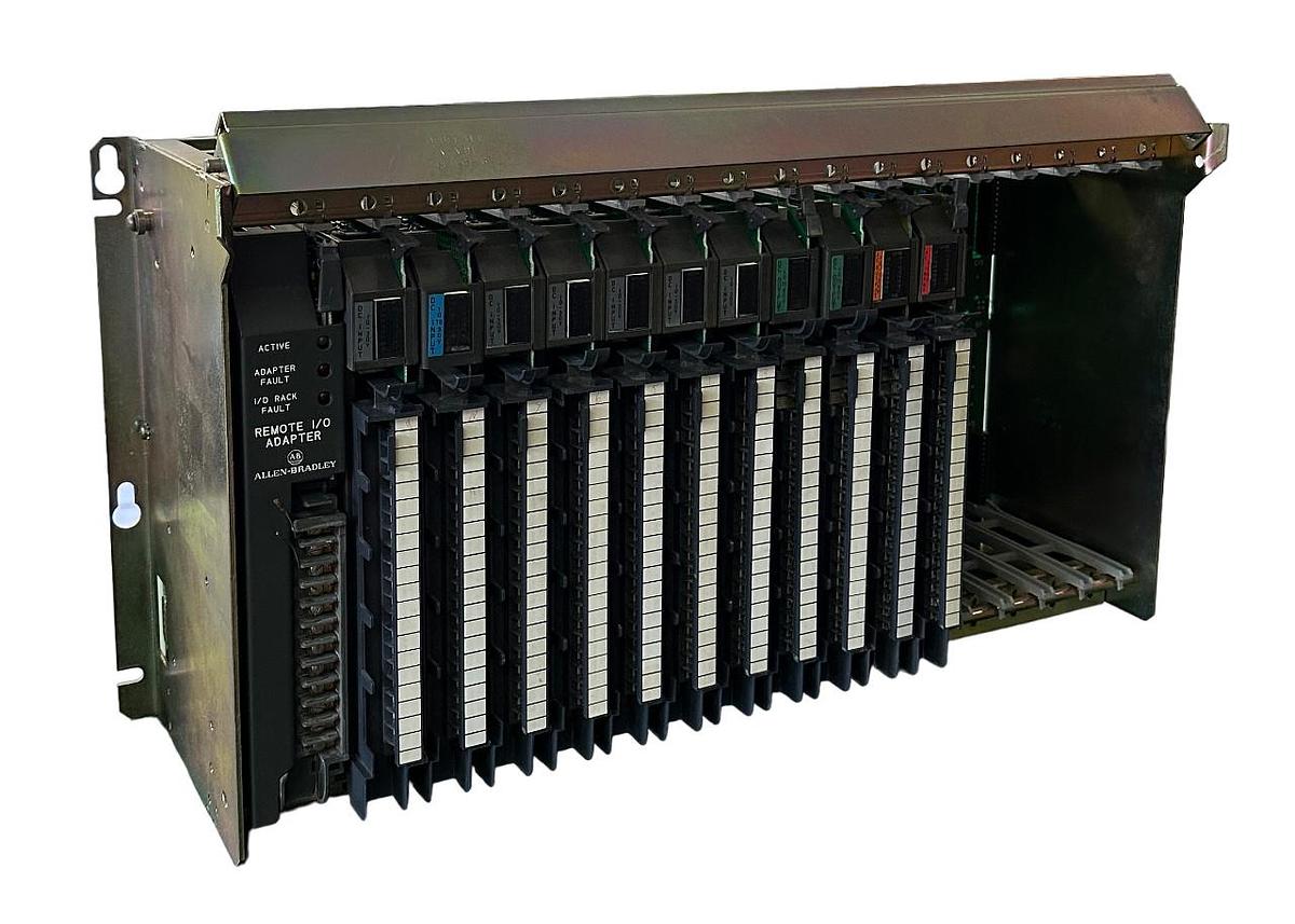 Used ALLEN BRADLEY 1771-A4B SER B 16-SLOT I/O CHASIS W/ MODULES