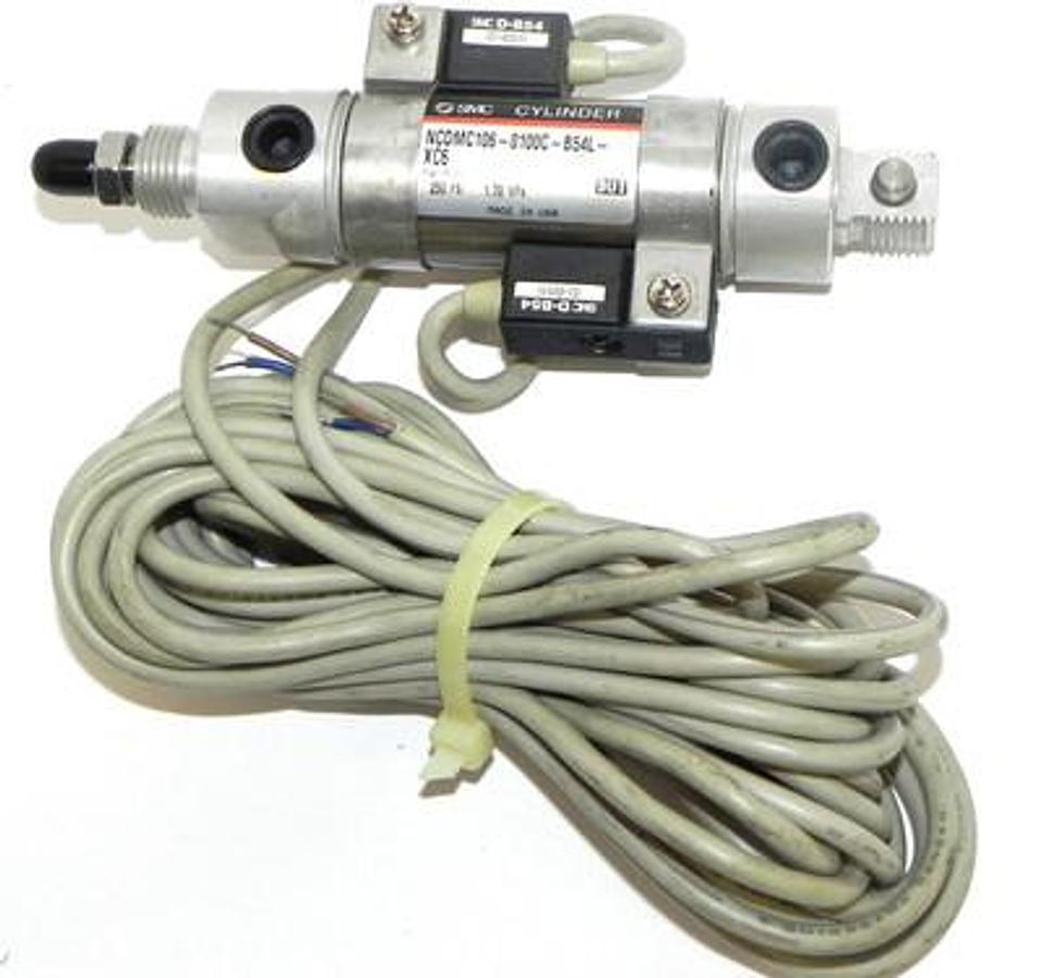 Used NEW SMC NCDMC106-0100C-B54L-XC6 CYLINDER W/ TWO D-B54 (D-B51) SWITCHES