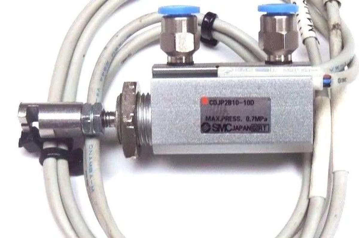 Used SMC CDJP2B10-10D PNEUMATIC CYLINDER W/ (2) SMC D-M9P REED SWITCHES