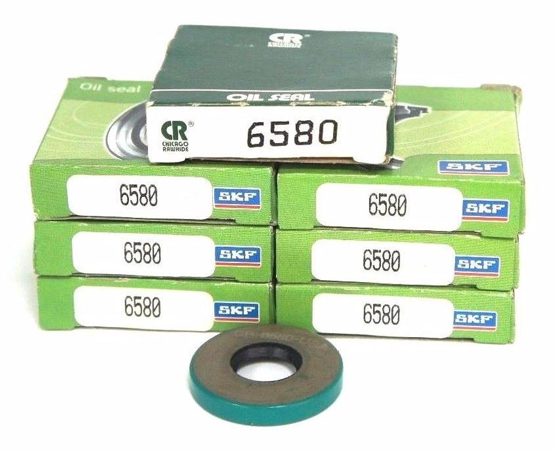 Used LOT OF 7 NIB SKF 6580 OIL SEALS 1-3/16" DIAMETER