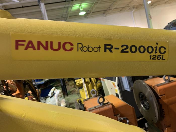 Used FANUC ROBOT LIQUIDATION SALE R2000iC/125L 6 AXIS CNC ROBOT WITH R30iB CONTROLLER, IR VISION, 125KG X 3,100 MM H REACH