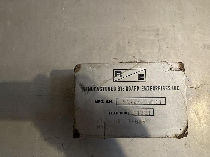Used Used Roark Industries approximately 10,000 gallon SS vertical tank