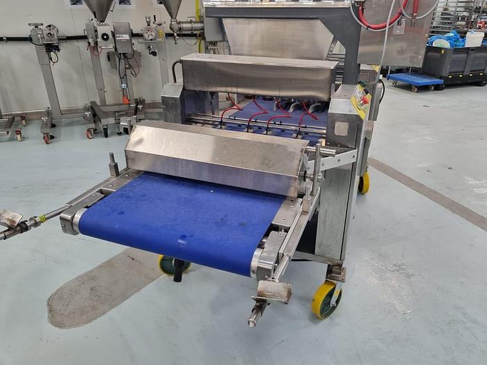 Used SETON'S  MINIMAX 4 across Sausage Roll Line