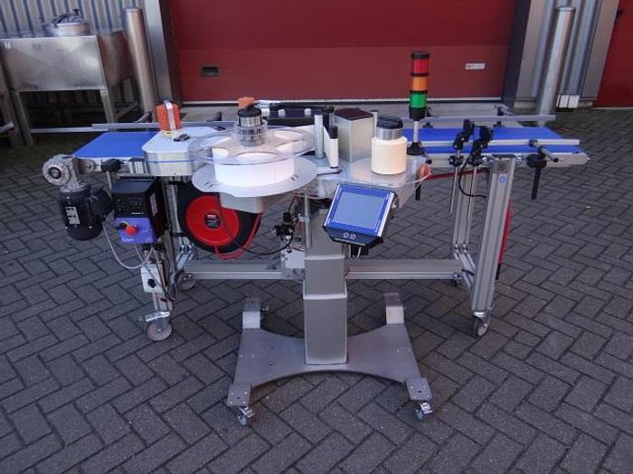 Used Videojet carton labeler with coder