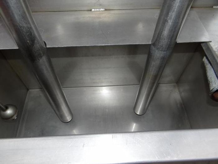 Used 2 station piston filler