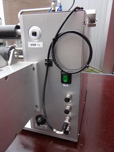 Used Semi automatic labeler for round containers