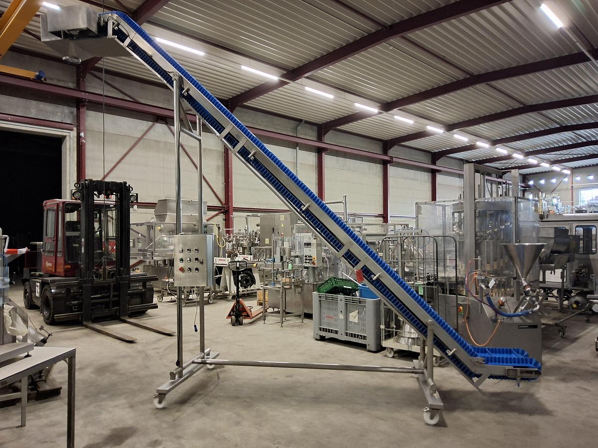 Gebruikt Upfeed conveyor / product elevator