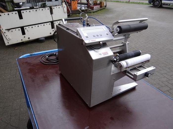 Used Semi automatic labeler for round containers