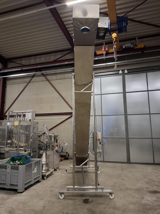 Gebruikt Upfeed conveyor / product elevator