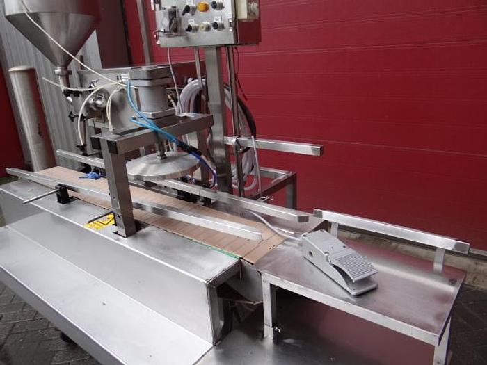 Used RVS afvulmachine met aandrukker