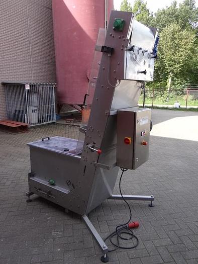 Used cap elevator and sorter