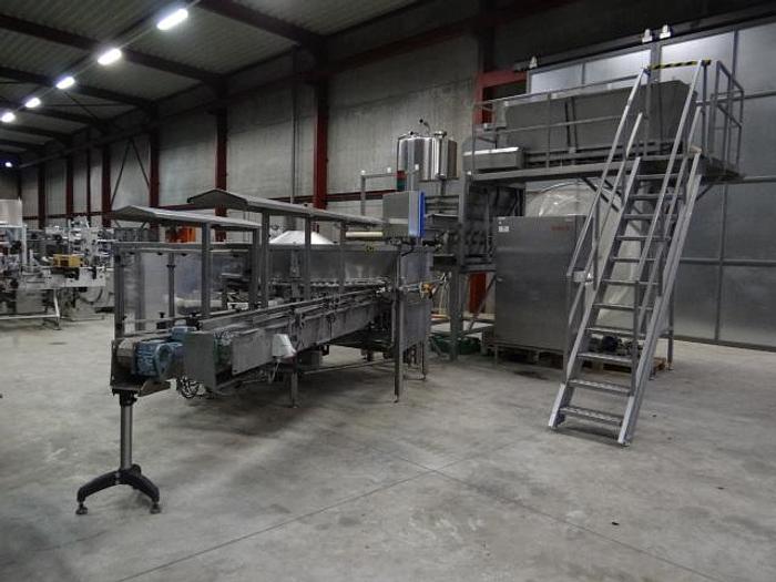 Used Rotating plate filler 40 station for cans or jars