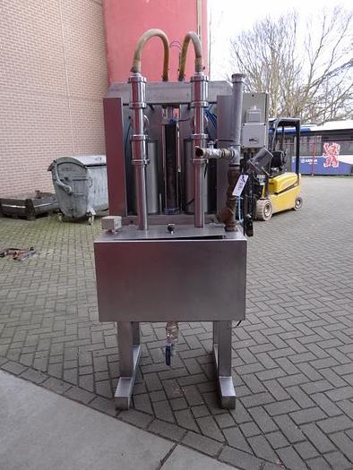 Used 2 station piston filler