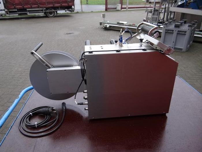 Used Semi automatic labeler for round containers