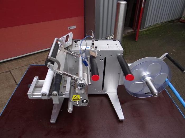 Used Semi automatic labeler for round containers
