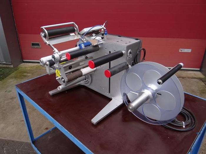 Used Semi automatic labeler for round containers