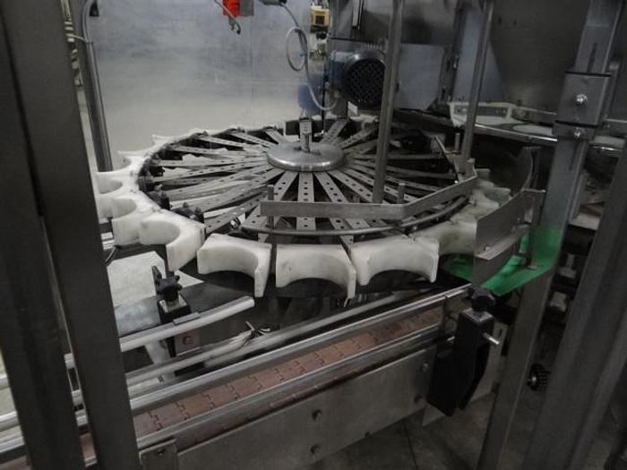 Used Rotating plate filler 40 station for cans or jars