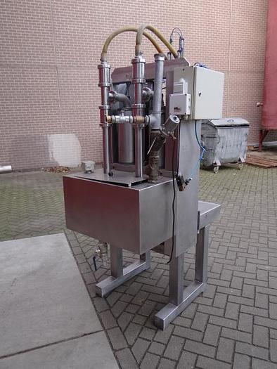 Used 2 station piston filler