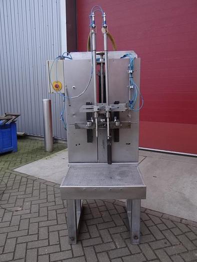 Used 2 station piston filler