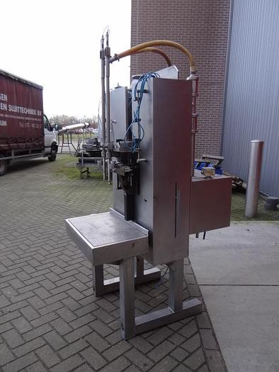 Used 2 station piston filler