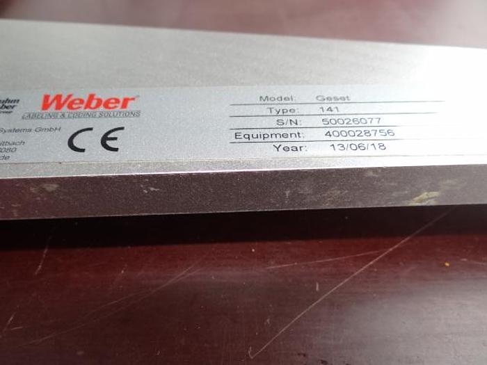 Used Semi automatic labeler for round containers