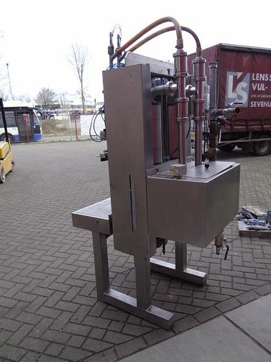 Used 2 station piston filler