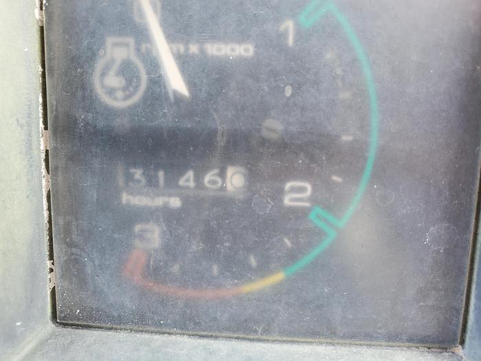 Used Case 580SE Backhoe w/ Attachments