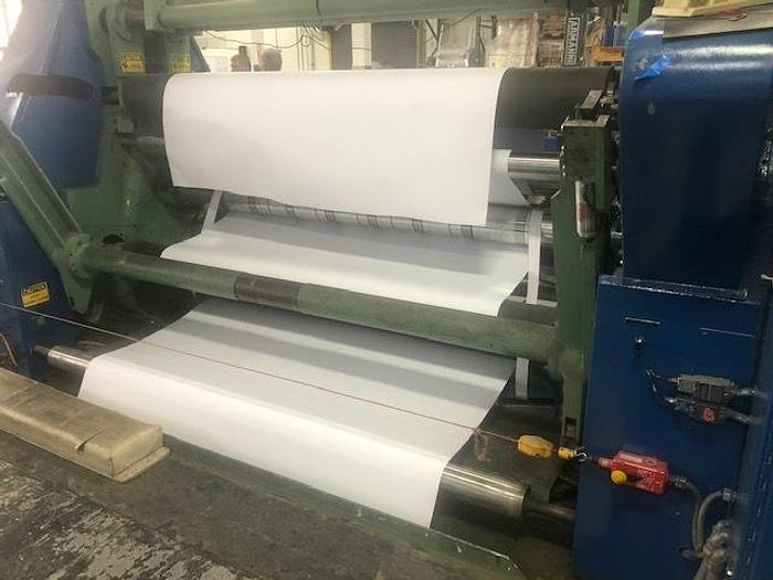 Used 72" WIDE REM CENTER SURFACE DUPLEX SLITTER REWINDER