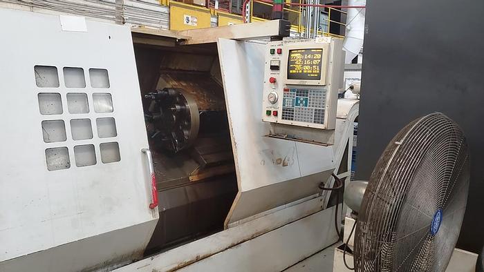 Used 1996 HAAS CCNC Lathe HL 4, 24" Swing, 9.5" Swing over slide, 30 HP, 3400 RPM, 3"  Bore, 12 Position Turret, HAAS CNC