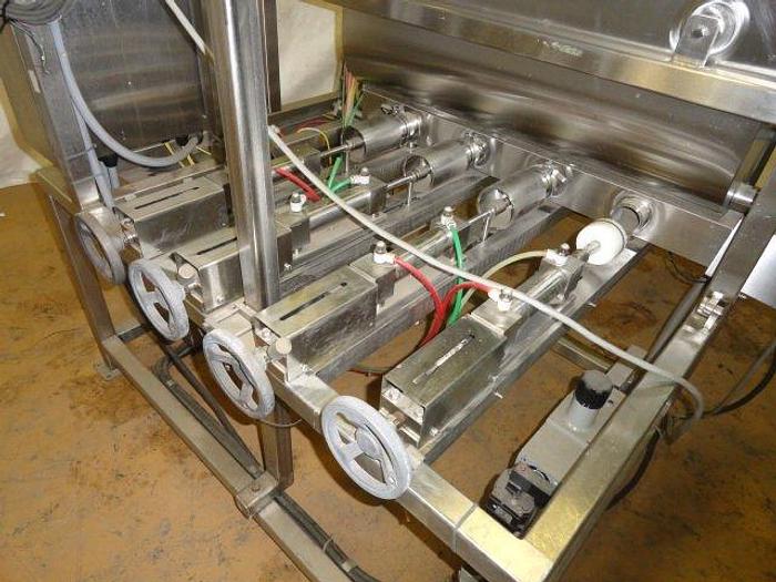 Used FEMC 4 Piston Filler; with (4) dispensing nozzles; Md#3700-000-002