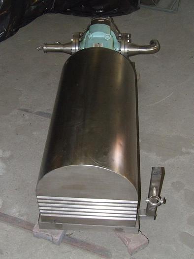 D'occasion Une pompe à lobes pour le rembourrage et les masses épaisses