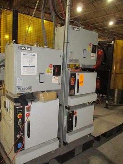 Used ABB IRBP C-1000 SPOT WELDING CELL WITH TWO ABB IRB 6640 180/2.55 ROBOTS & IRC 5 CONTROLLERS & ARO SERVO SPOT WELD GUNS