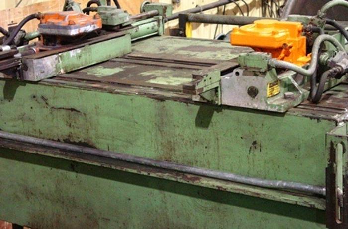 Used Coilmatic DXHF Stock Feeder | 12" Pull, Double Gripper Air Feed