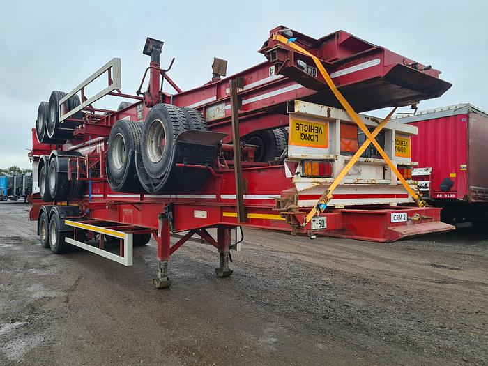 Used JORDAN 2 AXLE CONTAINER CHASSIS 40 2X20 FT CONNECTION ,STEEL SUSPENSION, DRUM BRAKES, DOUBLE TIRES.