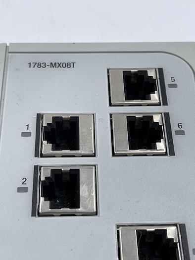 Used Allen-Bradley 1783-MS10T Ser A, 1783-MX08T (X2)