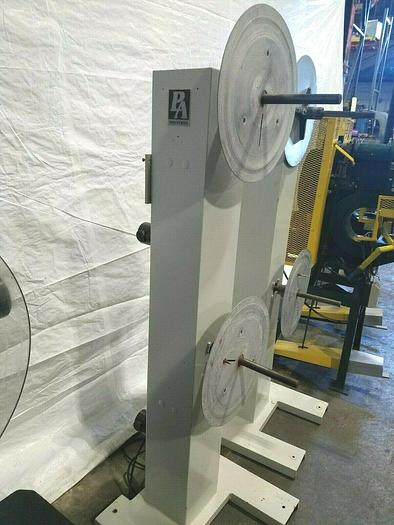 Used PA Industries Motorized Material Stock Reel with Paper Interleaf
